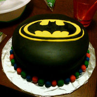 Batman Birthday Cake Cake I made for my little brother's birthday. A bit of a challenge because I had to fill and crumb coat with canned icing as that is...