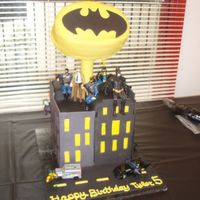 Gotham City / Batman Made for my son's 5th birthday party. Gotham city was made with fondant mixed with gum-tex, cut out, then hardened for 3 days. The...