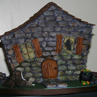 Haunted House All decorations are fondant or gum paste, except the roof. The roof is chocolate. The rock is all hand formed, not a mold. I love Halloween...