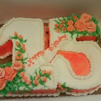 Dsc00217.jpg This was approximately a half sheet cake. Cut out numbers and buttercream iced