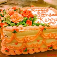 Dsc00304.jpg Another icecream cake. Whipped cream iced, buttercream decorations