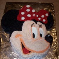 Minnie Mouse Birthday Cake I used a Mickey Mouse Band Leader Wilton cake pan from the 1980's (originally my first Birthday cake). I changed the hat into a bow...