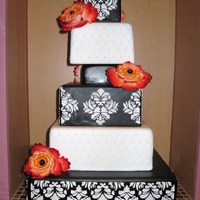 Square Demask 4" 6" 4" 8" 10" 14" Squares iced in fondant. 10" and 6" tiers were quilted using an impression mat...