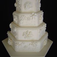Ivory Wedding Cake This cake was made for a customer who asked me to make a cake she saw in a magazine and it happened to be Martha Stewart's wedding...
