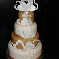 Hearts Delight Loved making this cake. Hearts were fragile to make though but well worth the finished result and loved the colours of the marbled paste...