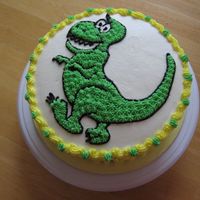 Green Dinosaur For my son's 5th birthday.This was an 8" round with buttercream frosting. I found the dinosaur picture on the internet and had my...