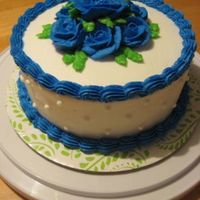 Blue Roses One of my Wilton class cakes. Blue buttercream roses.