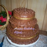 Chocolate Fondant Cake This was made for my Seventeen year old Sons, Birthday Party.It is homemade chocolate Fudge with chocolate butter cream, covered with M&amp...