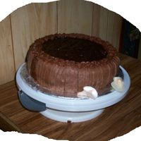 Dark Chocolate Dark Chocolate butter cream, covered with fondant, and pure chocolate in the middle, my husband wants me quit, Say's he is gaining...