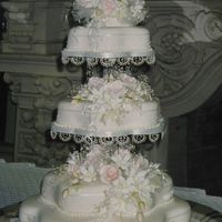 Victorian Wedding Cake served 150 people. It was designed to match the brides dress.