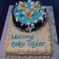 Rubber Ducky Baby Shower Got this idea from several different pics in the galleries.All Buttercream except for Oreo Cookie Stix on sides and mini rubber duckies.