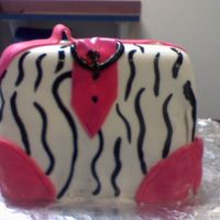 Purse Cake My first attempt with MMF, learned alot. Didn't know how to make handle stand up.