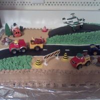 0919082019.jpg Chocolate cake for 2 year old. Tonka trucks, Buttercream and MMF, chocolate rocks. This cake was really fun and easy to do and they loved...