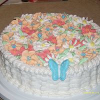 Cake_Pictures_005.jpg The second class I took focused on royal icing. This was the cake I put together with all the royal icing flowers I made.