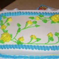 Cake_Pictures_002.jpg This was the second cake I decorated in class.