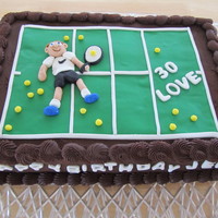 30Th Birthday Cake This was for my son's 30th birthday. He is an avid tennis player. Chocolate ganache icing with fondant accents for figure and tennis...