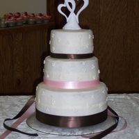 My First Wedding Cake Double CHoc. cake with choc fudge filling and a peppermint buttercream frosting.....