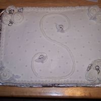 Initial S I was asked to do a cake for a wedding shower, another first, and no one knew the colors or anything...we did figure out the last name...so...