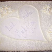 Bridal/groom Shower Cake I did this for my brother and his fiance's wedding shower today. Buttercream icing, lacework and flowers. I used clear sugar glitter...