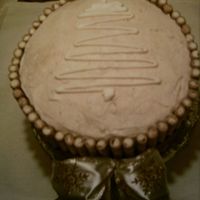 Eggnog And Spice Cake This is a cake I made for my friends at my Herbal Society club. It is a Spice cake from the recipie site, and Eggnog filling and frosting....