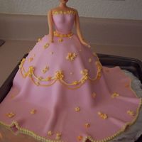 Barbie Cake This was my first doll cake, first ust of fondant (we used a recipe from cc and it turned out fabulous!), and first try at making drop...