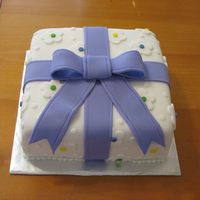 Fondant Cake With Bow From Course 3 This is my first fondant cake. I love using fondant, but I wished it tasted better.