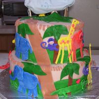 Jungle Baby Shower Cake This cake was made based on the invitation used for the baby shower. On top is a baby in a leaf bed with a blanket and a "sheet"...