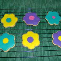 Flower Cookies I made these cookies as practice. They are covered in thinned royal icing.