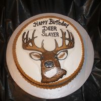 Oh Deer, Oh Deer This is a 12" marble cake covered in bc with a bc transfer of a deer head.