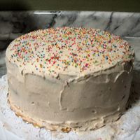 My First Cake! Magnolia Bakery Vanilla Cake, 3 layers with buttercream and raspberry jam. Cake a bit dry buttercream super sweet!