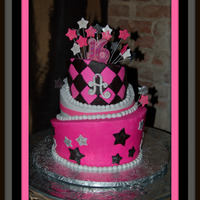 Pink & Black 10" 8" 6" topsy turvy butter cream with fondant accents.