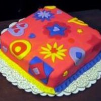 Sixties Theme My spouse is an artist. He loves off-beat stuff. When I mixed the yellow and orange fondant together so I had enough to cover the cake, it...