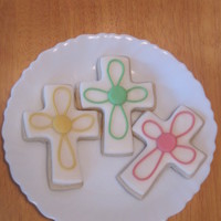 Baptism Crosses for the baptism of a threesome ( reason for the different colors) . sugar cookies topped with MMF.