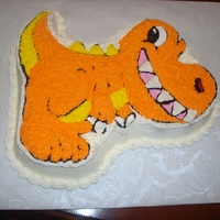 Luke's Dinosaur Vanilla cake covered in butter cream.
