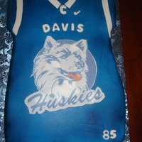 Geremy's Off To College Cake Football Jersey Cake covered in fondant and layered with edible image of the Huskies. Way to go Geremy!