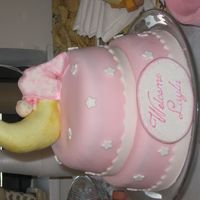 Baby Shower Moon Cake a variation of the great sleeping-baby-on moon cakes I found here....