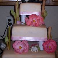 Bamboo, Peonies, And Pandas all hand made from gumpaste, bamboo and peonies airbrushed.