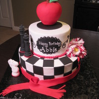 Twilight My first time posting,... so here goes! Just finished a Twilight cake representing the four books in the series (different chess pieces)....