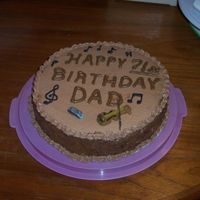German Chocolate Bd Cake German Chocolate cake with coconut pecan frosting in middle and sides. Chocolate BC is used for top and borders. fondant harmonica and...