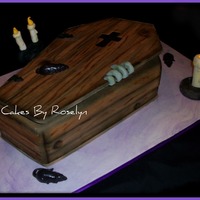 Wooden Casket cake made for a Halloween party i was really excited to do this cake because i have never gotten to do a Halloween cake. all fondant thanks...