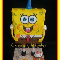 Sponge Bob Square Pants sponge bob cake. my dad made the support system to make him stand. it was so cute when i took the cake all my nephew could say was how did...