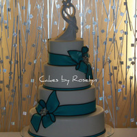 Black And Turquoise oval wedding cake the bride wanted simple and clean. all fondant thanks for looking