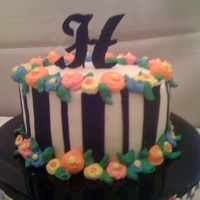 Mary Engelbreitish Cake! Inspired by another baker on CC! Buttercream except for fondant black stripes and initial. Fun (and quick!) cake. Just happened to have the...