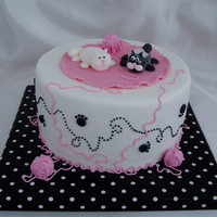Cats Playing With Yarn This was one of two cat themed cakes for a baby shower. I hate to do animals, but my fat cats are growing on me :). The yarn is RI piping,...