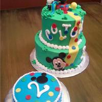 Mickey Mouse Clubhouse Iced in buttercream with fondant accessories... Clubhouse is gumpaste.