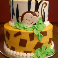 Safari Iced in buttercream with fondant accessories.