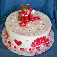 Bear Birthday Cake Buttercream iced, fondant/gumpaste decor. Bear was designed after customers favorite build a bear