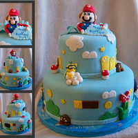 Mario Cake Covered in MMF, most figures and Mario are mmf w/ gumpaste added.