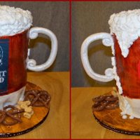 Beer Mug Cake I use four 6in cakes stacked. I used a 6in SPS round between them. Each one was torted and filled with ganache and covered in buttercream....