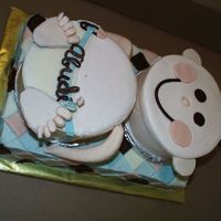 Baby Cake (2) 2-layer 6" cakes makes the baby, one 2-layer 9x13 sheet cake makes the blanket, all cake is chocolate with nutella/raspberry...